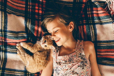 Kids with ASD can benefit from having a cat in the home. Having a cat can help children with ASD.